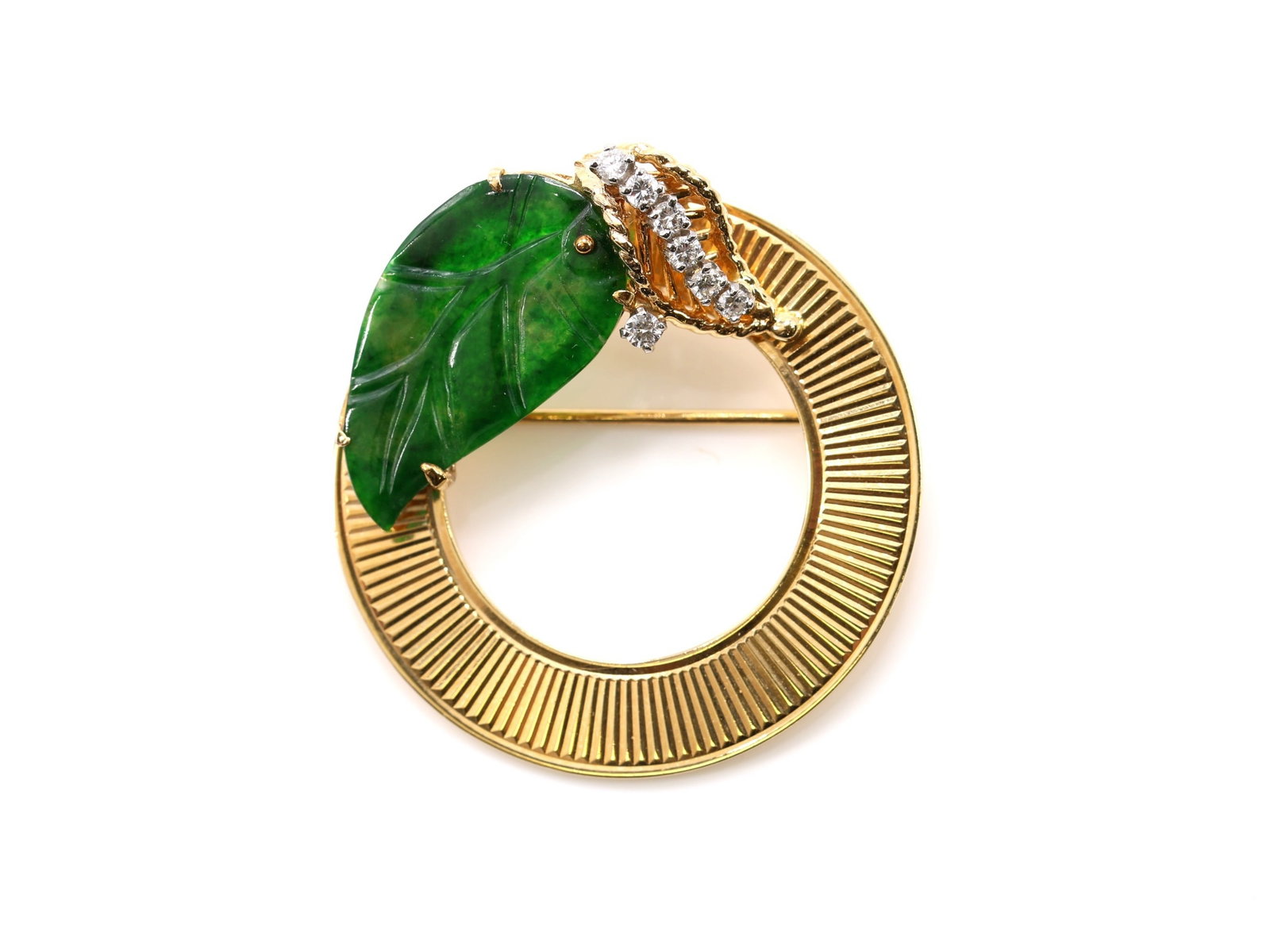 14k YG Jade Pin: 14k yellow gold circle pin set with a carved jade leaf and round cut diamonds, 1.5", 9.3dwt.