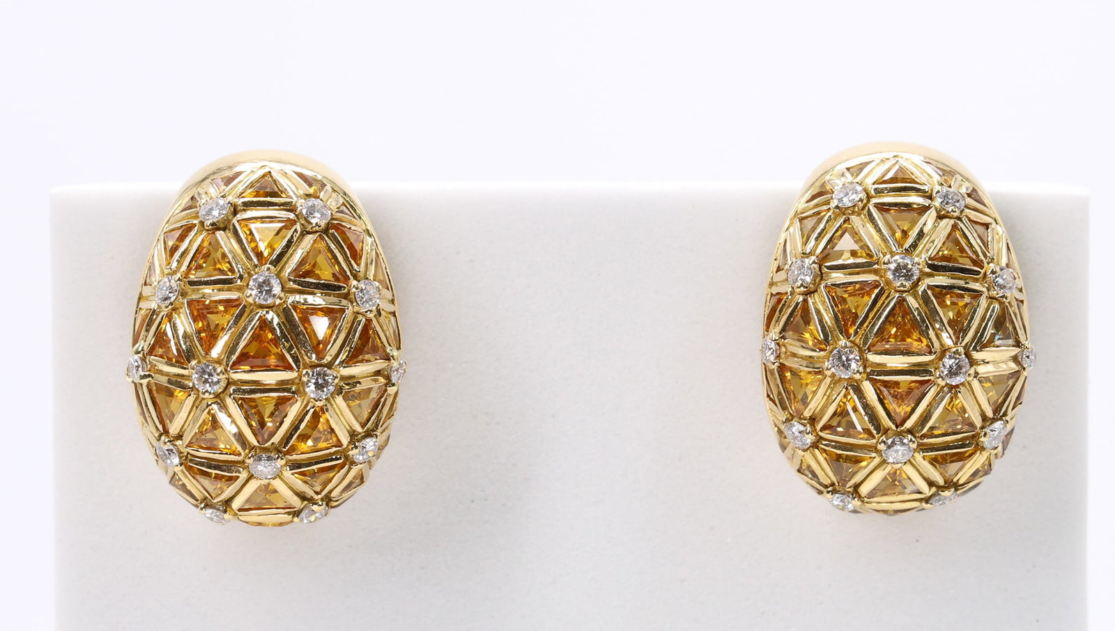 18k YG Diamond Citrine Earrings: 18k yellow gold earrings set with round diamonds and triangular cut citrines in a lattice design, 7/8", 13.4dwt.