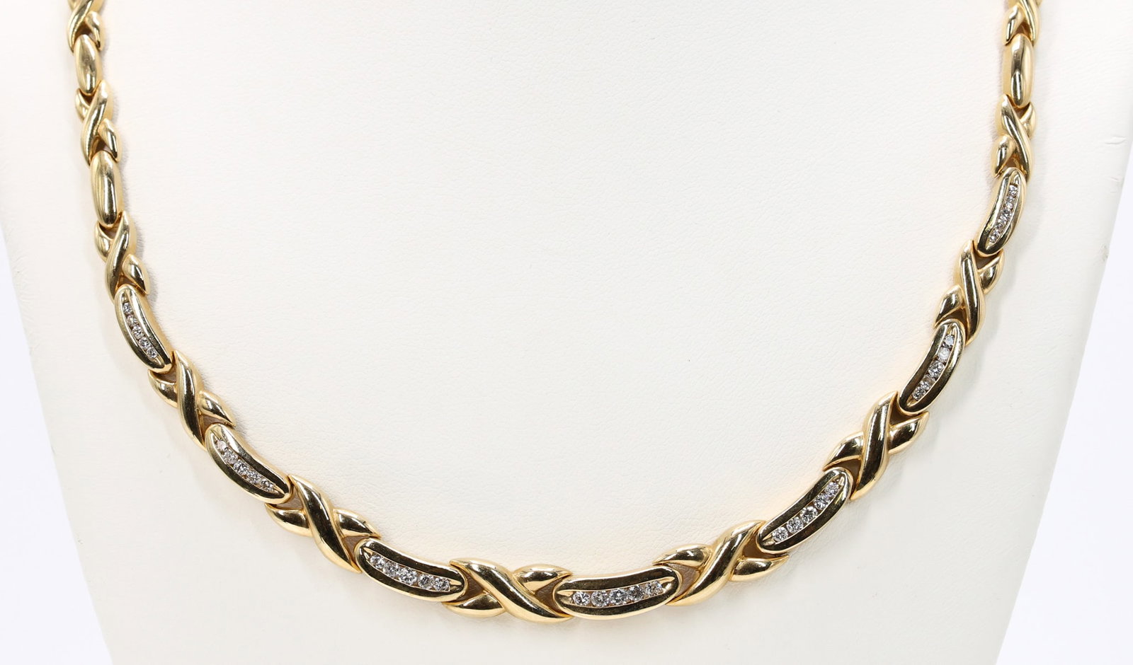 14k YG Diamond Necklace: 14k yellow gold diamond necklace with curved link design and diamond accents, 21.2dwt.