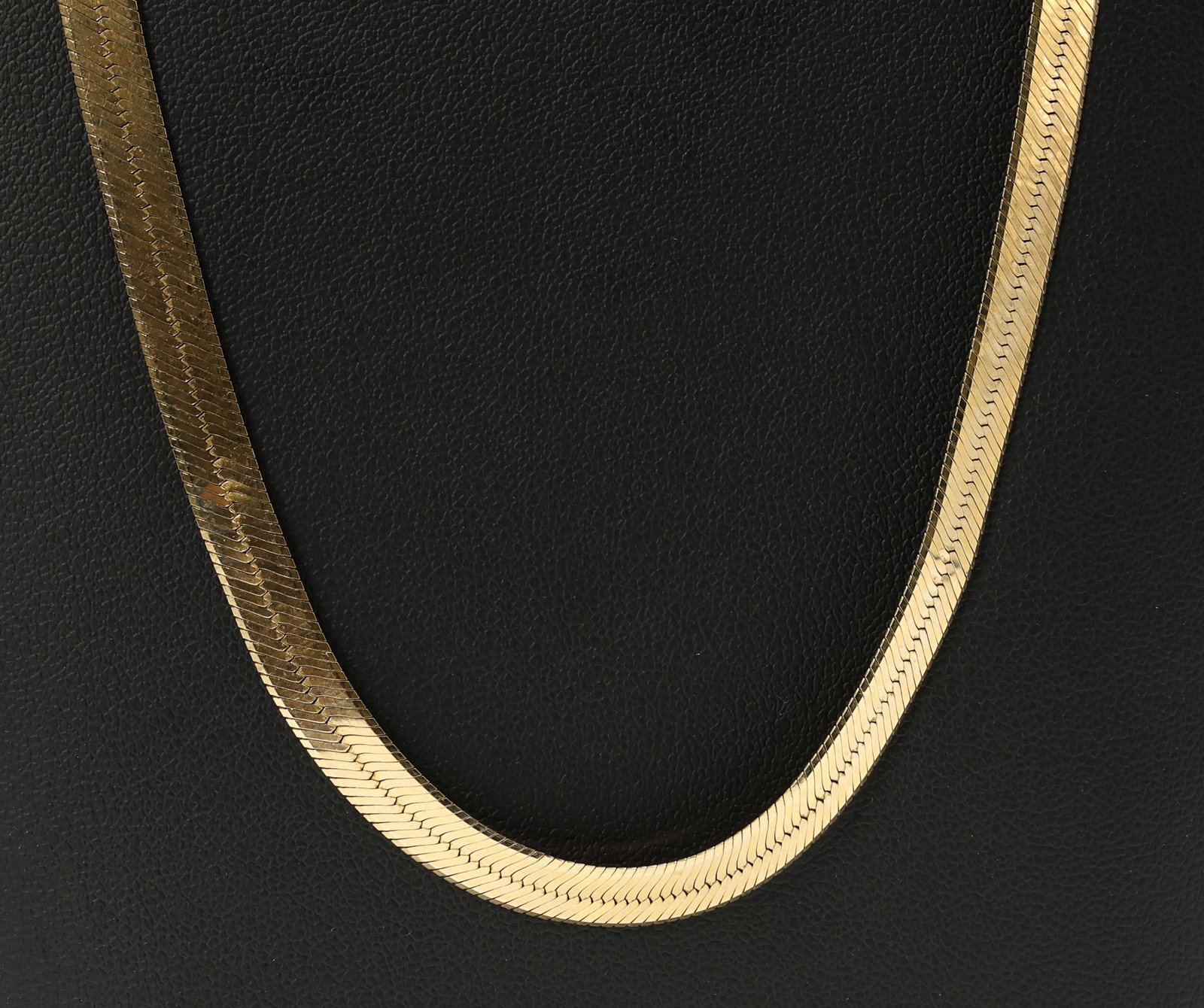 14k YG Necklace: 14k yellow gold herringbone chain necklace, 24" length and 15.1dwt.