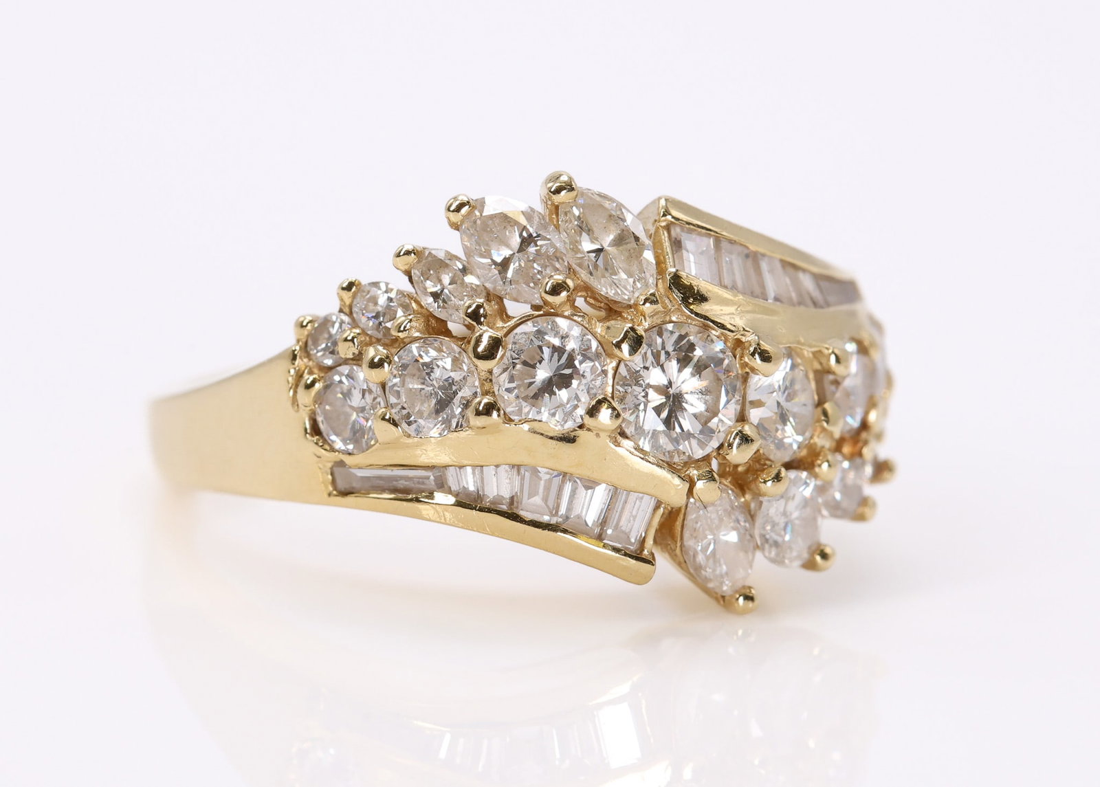 14k YG Diamond Ring: 14k yellow gold ring set with round brilliant, marquise, and baguette cut diamonds totaling approximately 2.00ctw, size 7.5 and 3.8dwt.