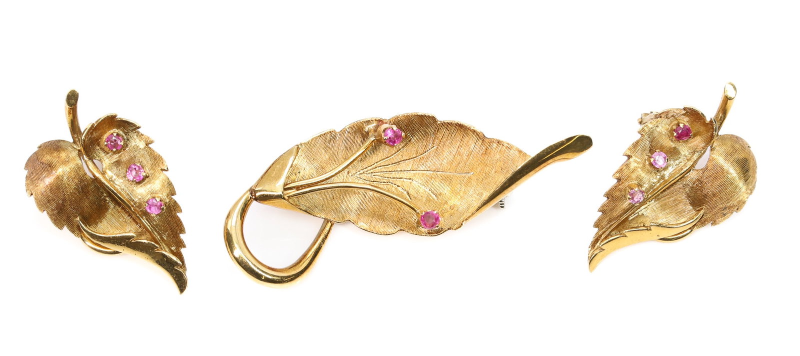 18k YG Ruby Earrings and Pin: 18k yellow gold leaf form brooch and earring set accented with round cut rubies, brooch 1.75", earrings 1.1", total 7.8dwt.