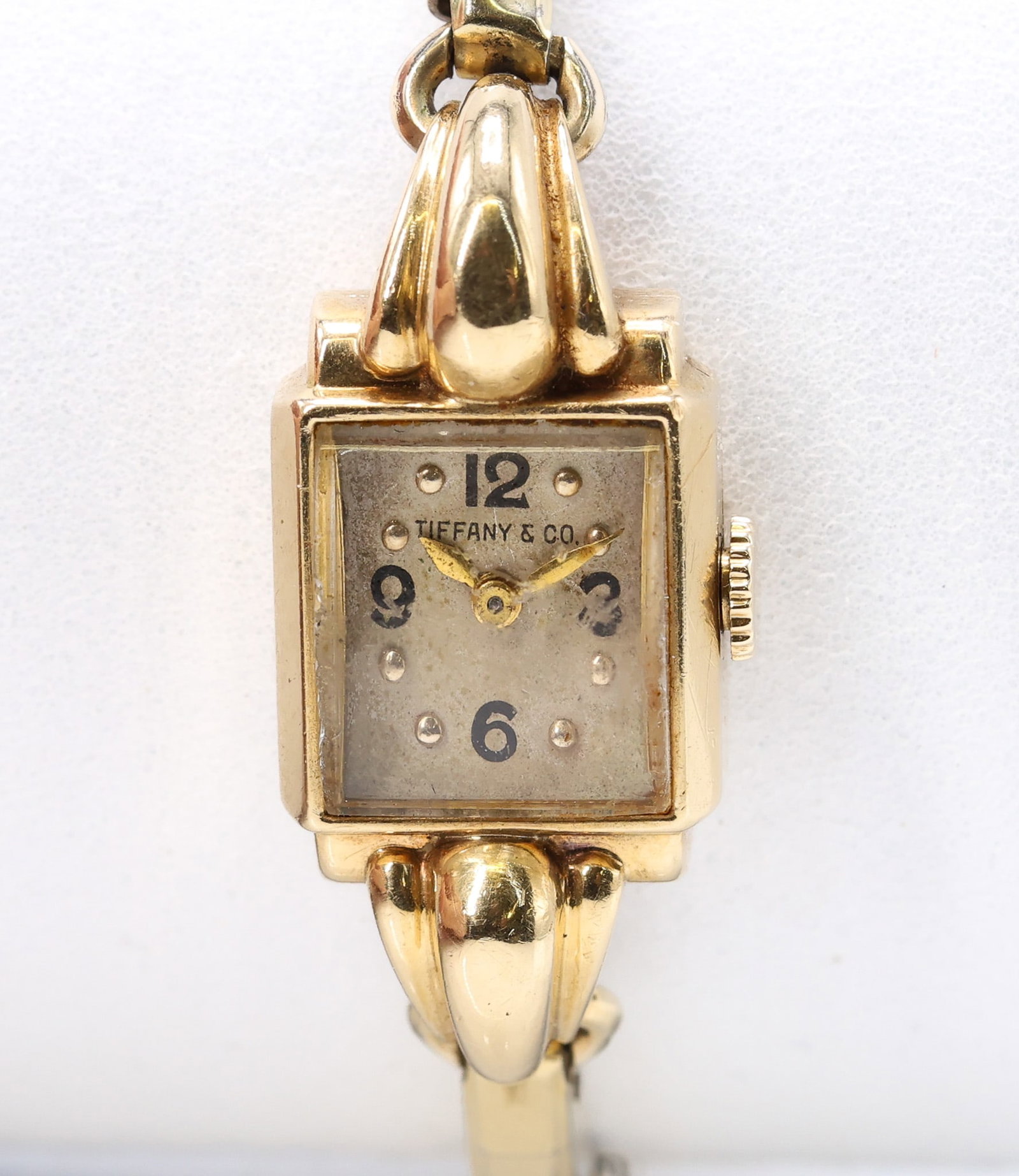 14k YG Tiffany & Co. Wristwatch: 14k yellow gold Tiffany & Co. ladies wristwatch with square dial and gold filled band.