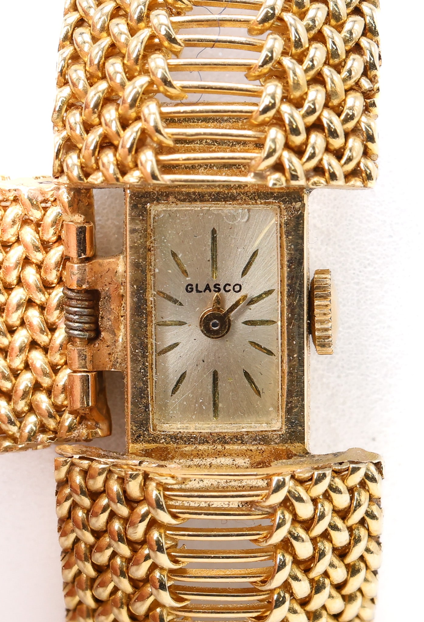 14k YG Glasco Wristwatch: 14k yellow gold Glasco ladies wristwatch with 17 jewel Swiss movement and 14k woven bracelet band, 6.5", 31.6dwt gross, 29.4dwt excluding works.