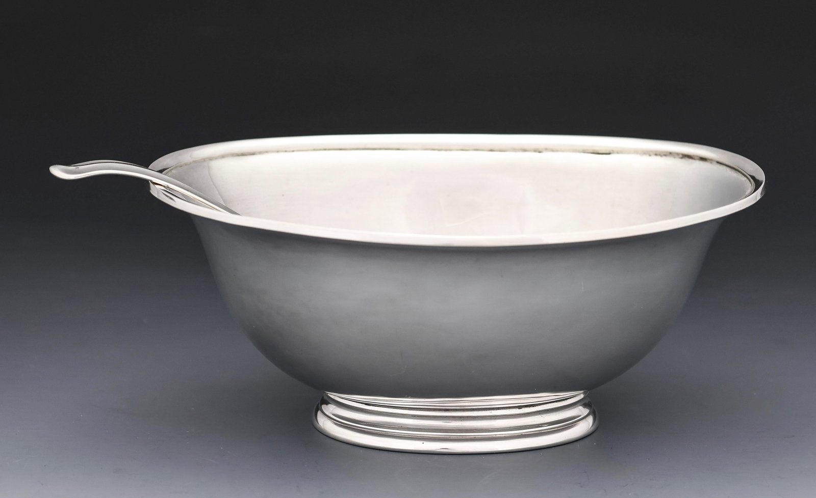 Stone Associates Sterling Silver Sauceboat and Ladle: American Arts and Crafts sterling silver footed sauceboat and a "Hanoverian-Mid Rib" sauce ladle. Both with the Stone Associates mark (1937 - 1957), the sauceboat with the artisan mark for Arthur L. H