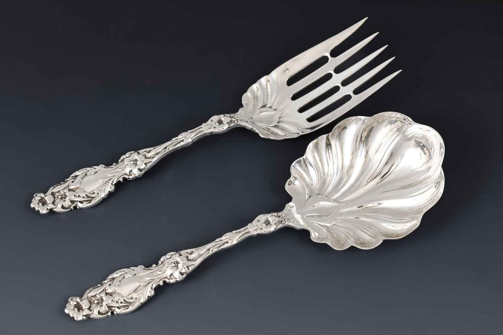 Whiting "Lily" Sterling Silver Salad Serving Set: American sterling silver salad serving fork and spoon. No makers marks noted. (2) pieces. 9". 8.07 ozt