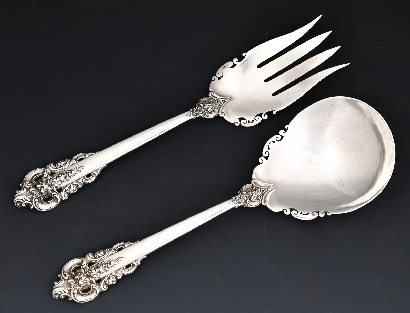 Wallace "Grande Baroque" Sterling Silver Salad Serving Set: American sterling silver salad serving fork and spoon. (2) pieces. 9.25". 8.48 ozt