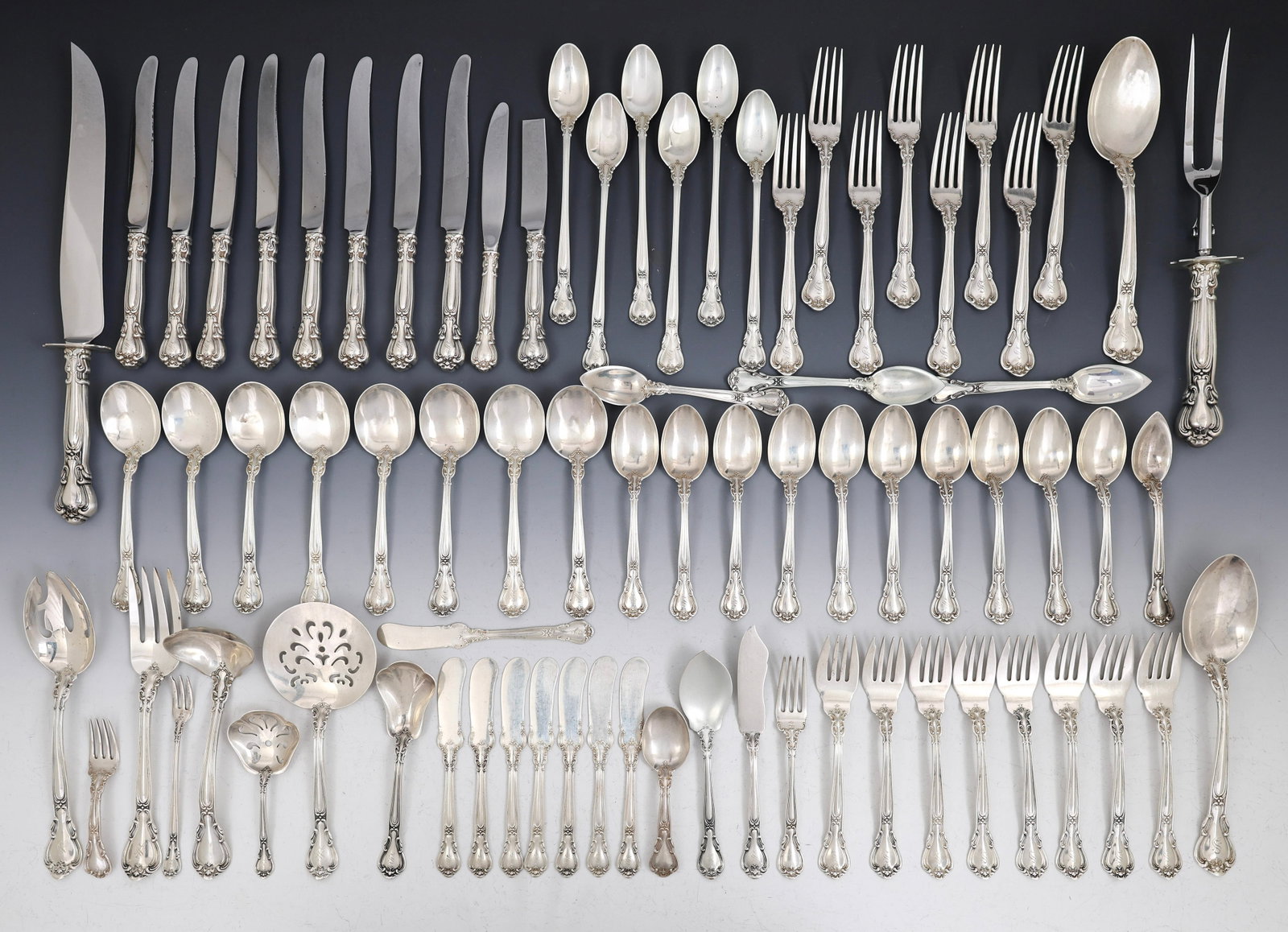Gorham "Chantilly" Sterling Silver Flatware Service for 8 With Extras: American sterling silver service, including 6.75" dinner forks, 8.75" hollow handle knives, salad forks, soup spoons, teaspoons, a hollow handle master butter (tip broken/missing), a flat master