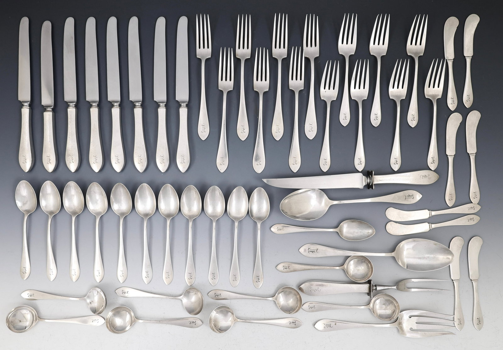 Watson "John Adams" Sterling Silver Flatware Service for 7 With Extras: American sterling silver service, including 7" dinner forks, a 9" hollow handle knife, 9.25" hollow handle knives, salad forks, soup spoons, teaspoons, butter spreaders, tablespoons, a cold meat