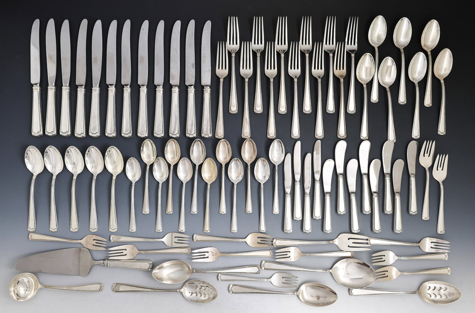Blackinton "Scroll and Bead" Sterling Silver Flatware Service for 12: American sterling silver service, including 7.5" dinner forks, 9.5" hollow handle knives (modern and new French blades), salad forks, soup spoons, teaspoons, hollow handle butter spreaders (straight