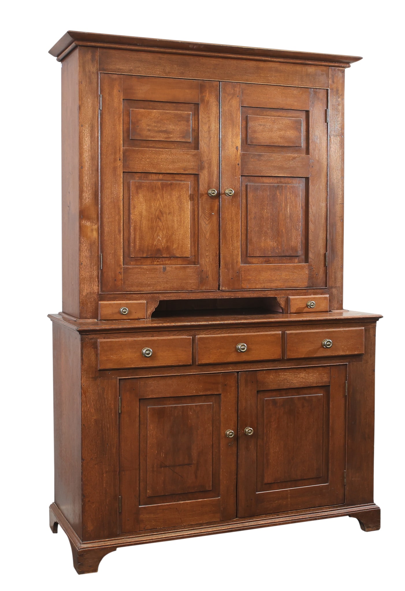 Pennsylvania Dutch Cupboard: Oak two-part cupboard with a molded cornice, two doors with a mauve painted interior over two short drawers with a 3.25" pie shelf over three drawers over two doors with mauve a painted interior, on