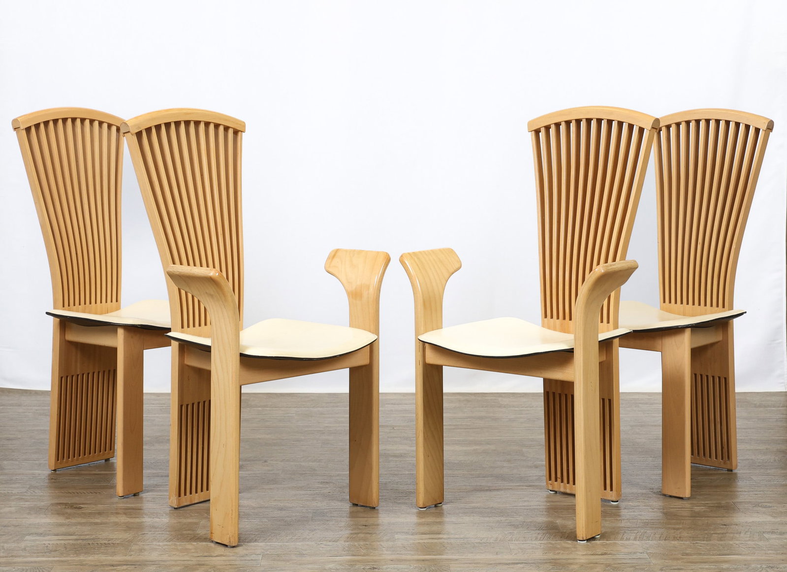 Pietro Constantini Dining Chairs: Italian Postmodern dining chairs, blonde wood, with slatted fan backs which extend to the floor, straight square front legs, and floating white leather seats. Including (2) armchairs 40"h x 25"w x