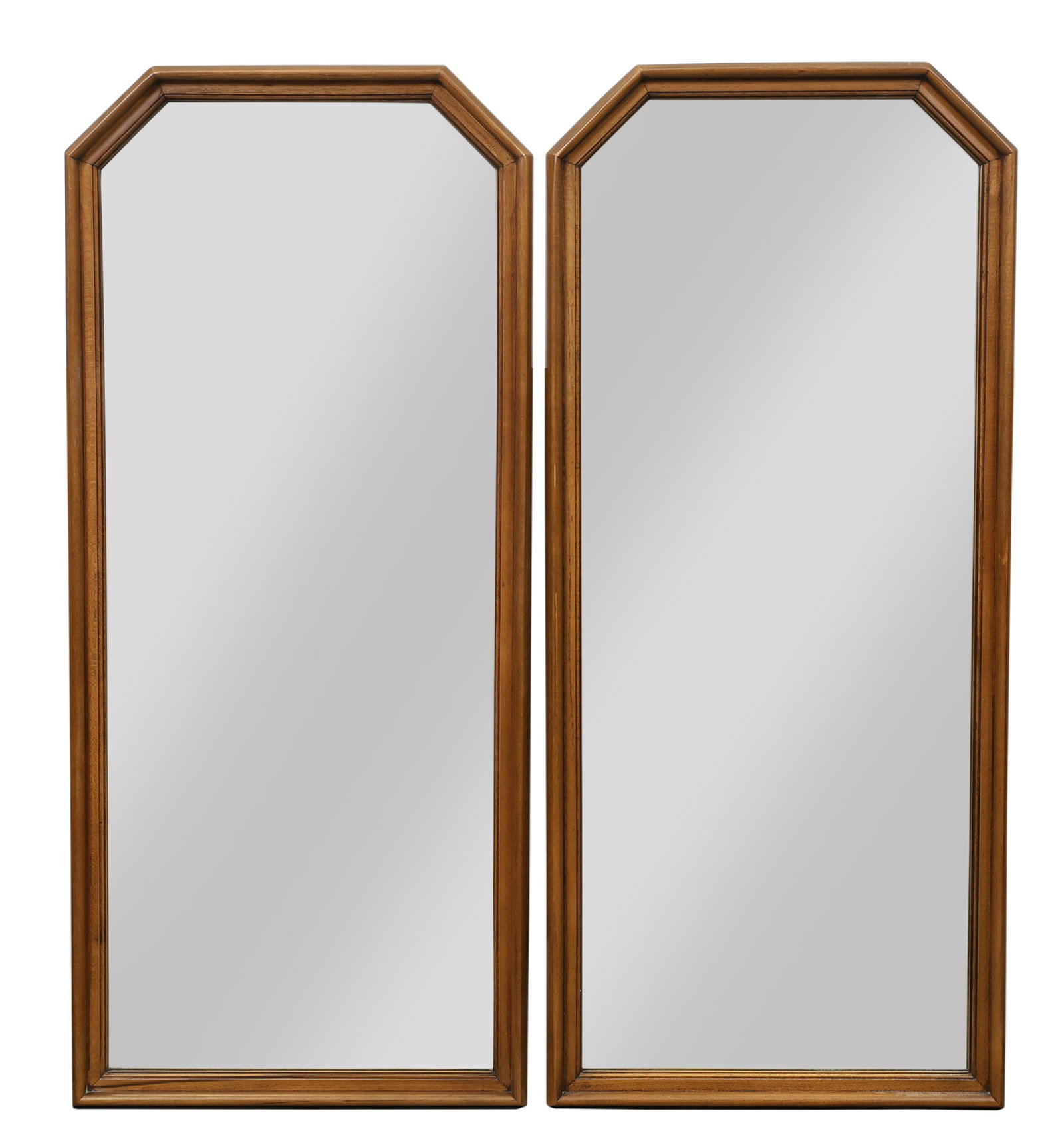 American of Martinsville "Format" Mirrors: No. 8216-4 walnut twin mirrors with angular tops. Stamped. (2) pieces. 42"h x 18"w x 2"d
