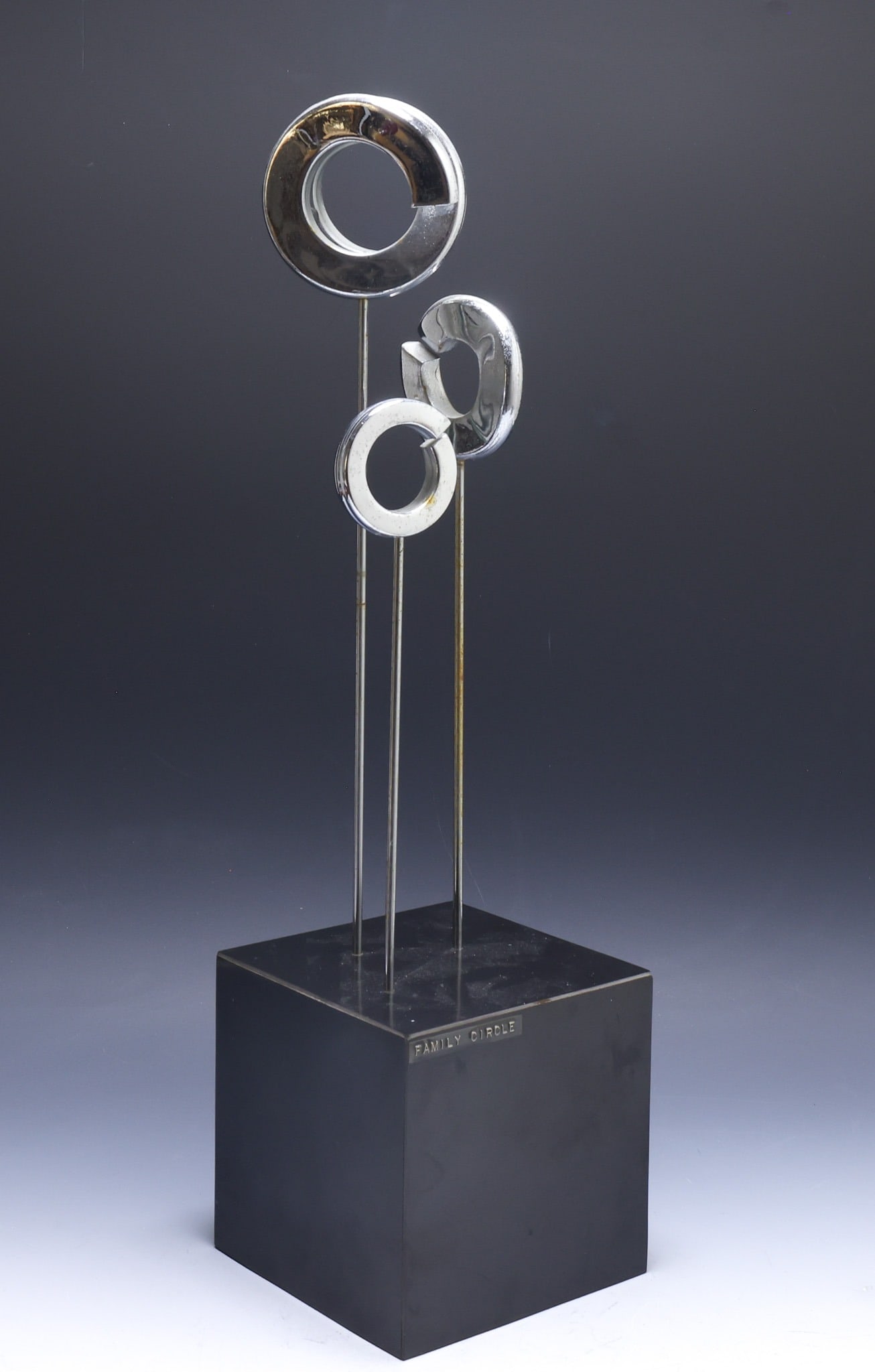 Joseph Gander (20th C.): Abstract sculpture, "Family Circle", chrome steel and formica, signed and dated 1970. 22.5"h x 6"w x 6"d