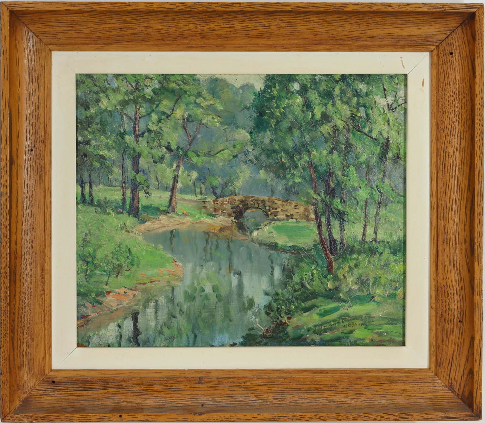 Walter Emerson Baum (1884 - 1956): Oil on board, SLR. Impressionist landscape with stone bridge over a stream in wooded park. 10"h x 12"w and 15"h x 16.5"w framed