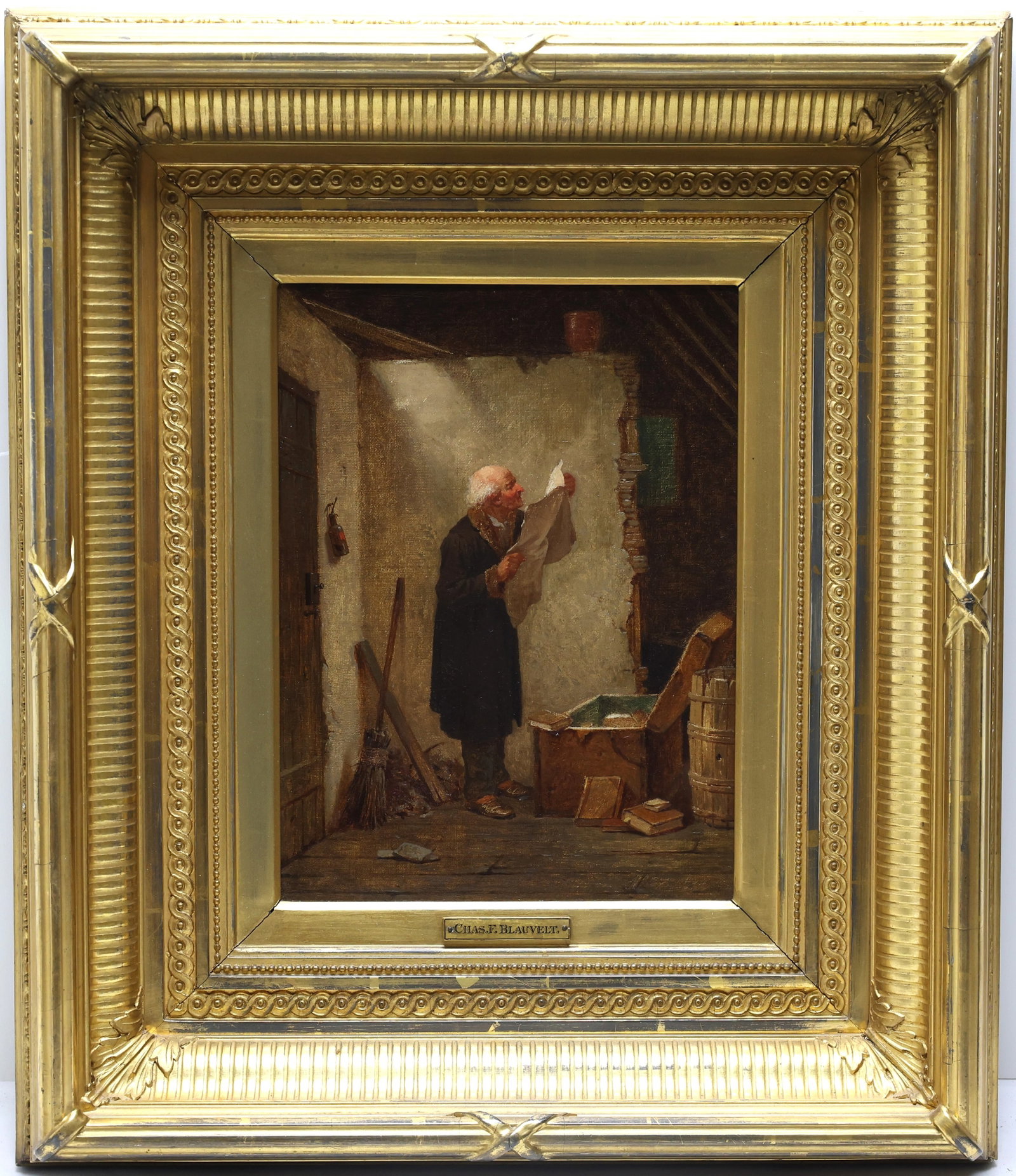 Attrib. Charles Blauvelt (1824 - 1900): Oil on canvas, unsigned. Realist interior genre scene of a man reading a newspaper in an attic or storeroom. 12"h x 9"w and 21.5"h x 18.5"w framed