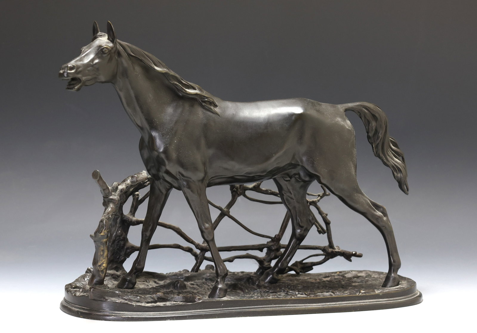 After Pierre Jules (P.J.) Mene (1810 - 1879): Bronze sculpture, depicting a horse standing by a fence, with impressed signature to the base. 11"h x 14"w x 6"d