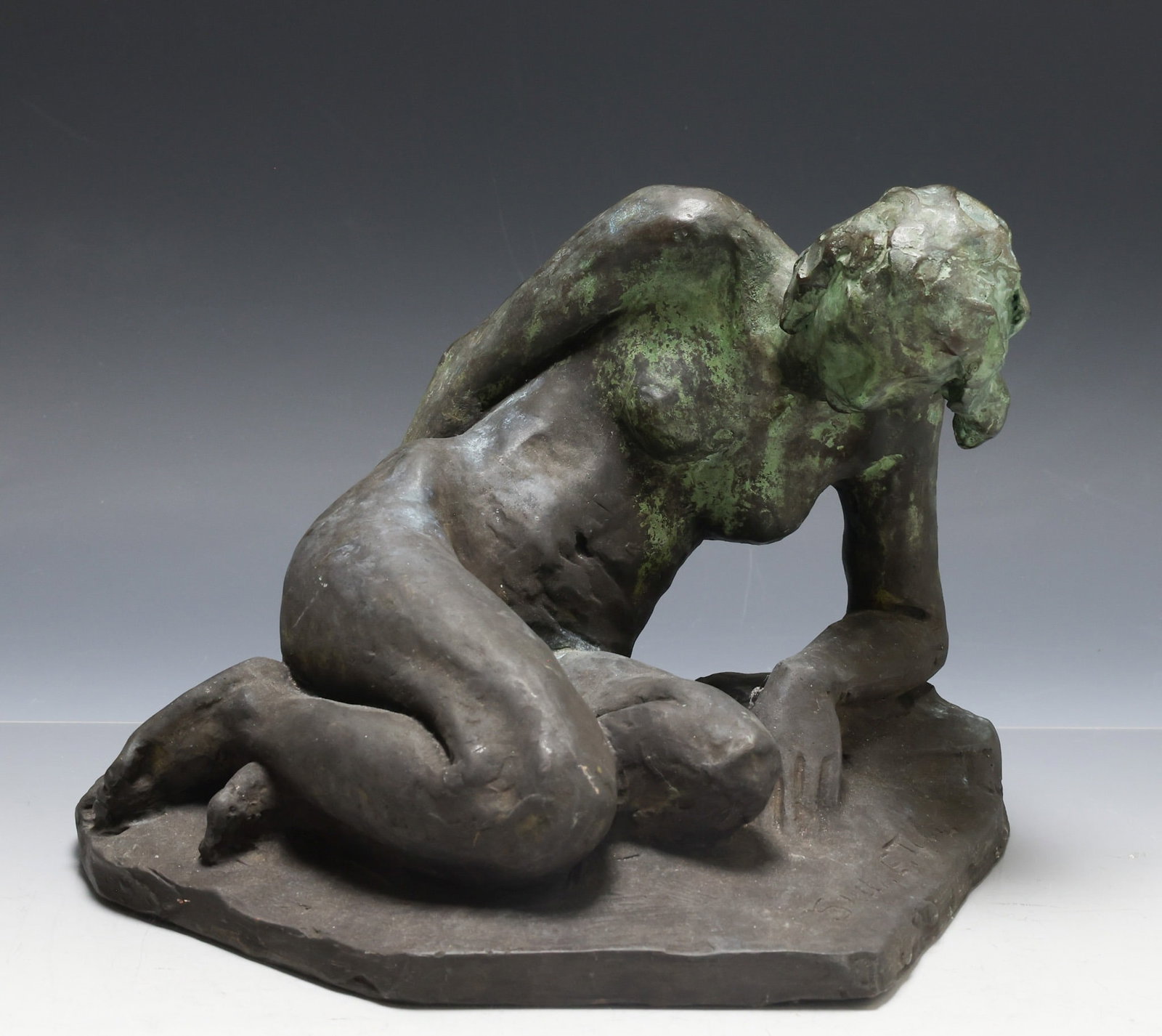 Stella Elkins Tyler (1884 - 1963) FA: Bronze sculpture with patina, depicting a reclining nude woman, impressed signature to the base. 8"h x 10"w x 10"d