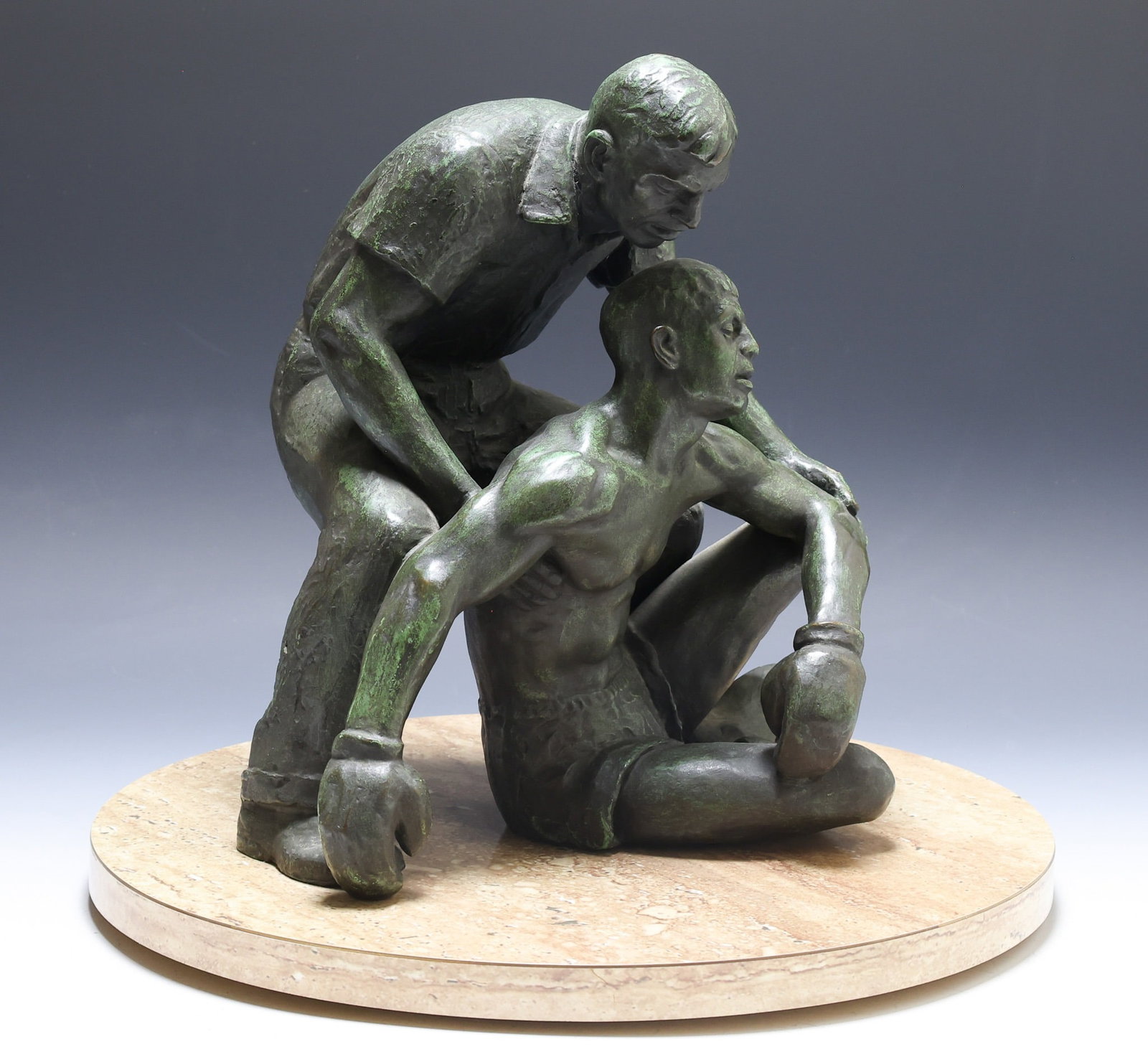 Joe Brown (1909 - 1985): Bronze sculpture, "Pieta 1944 / 1969", depicting an exhausted boxer and his trainer, with an impressed signature and date of 1969. Marked for Modern Art Foundry. 12.5"h x 11"w X 10"d on 15"w faux