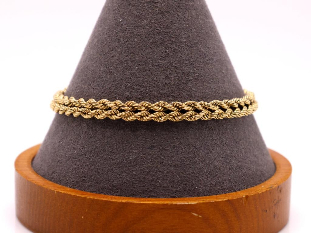 14k YG Bracelet: 14K yellow gold double rope link bracelet with integrated clasp. 8" and 9.8 dwt.
