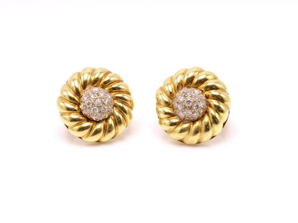 14k YG Diamond Earrings: 14K yellow gold swirl motif earrings set with approximately 0.50 carat total weight of round brilliant cut diamonds. Total weight 9.5 dwt.