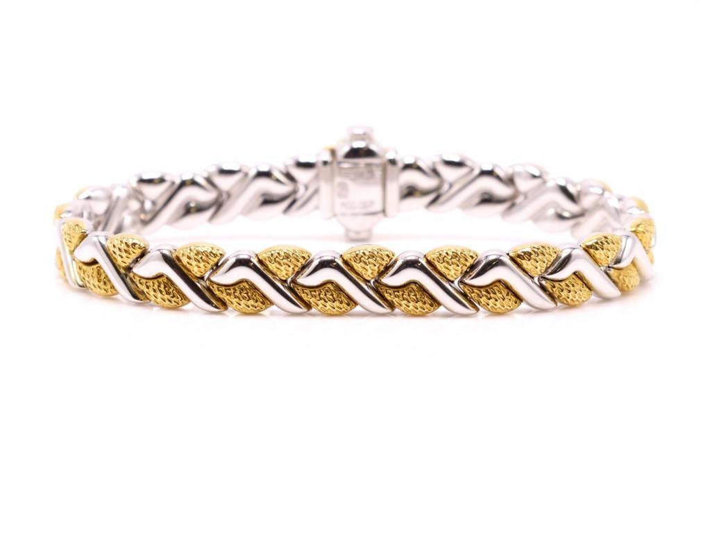 18k YG/WG Bracelet: 18K yellow and white gold two-tone fancy link bracelet with integrated clasp. 7.5", 12.0 dwt.