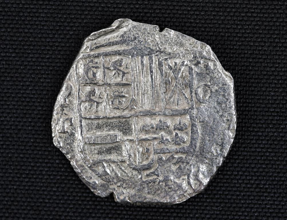 Atocha Shipwreck Philip III Silver 8 Reales Coin: 17th century Spanish 8 reales silver coin, minted in Potosi, Bolivia, assayer Juan Ximenez de Tapia, recovered in 1985 from the Nuestra Senora de Atocha shipwreck, which occurred in 1622. Includes COA