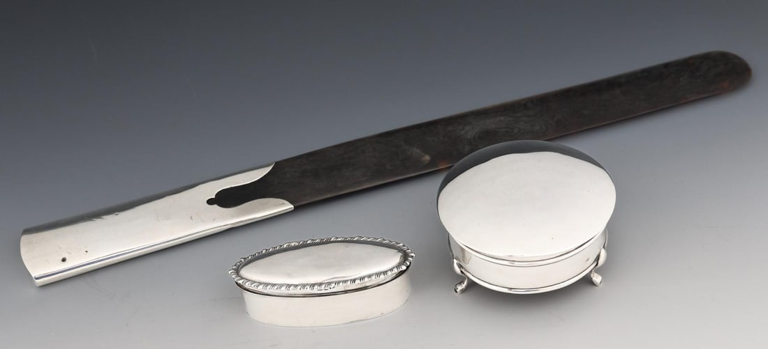 Edwardian British Sterling Silver Vanity Accessories: British sterling silver pieces, including an oval ring box with gadrooning, Chester, 1901, by James Deakin & Sons (John & William F. Deakin), 1"h x 3.25"w x 1.5"d, a sterling hollow handle page turner