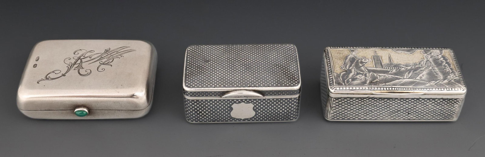 Imperial Russian Silver Boxes and Coin Purse: Imperial Russian 84 zolotnick (875 silver) pieces, including a pill box with geometric niello decoration and gold washed interior, with an 1881 assayers mark (illegible initials), and makers mark for 