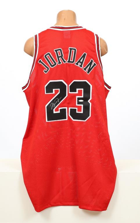 Michael Jorden Signed Chicago Bulls Jersey: Authenicated and witnessed with C.O.A. by Upper Deck with holographic marking No. BAF36106 of Michael Jorden's red Chicago Bulls No. 23 Nike size 50 jersey. Includes original upper Deck box.