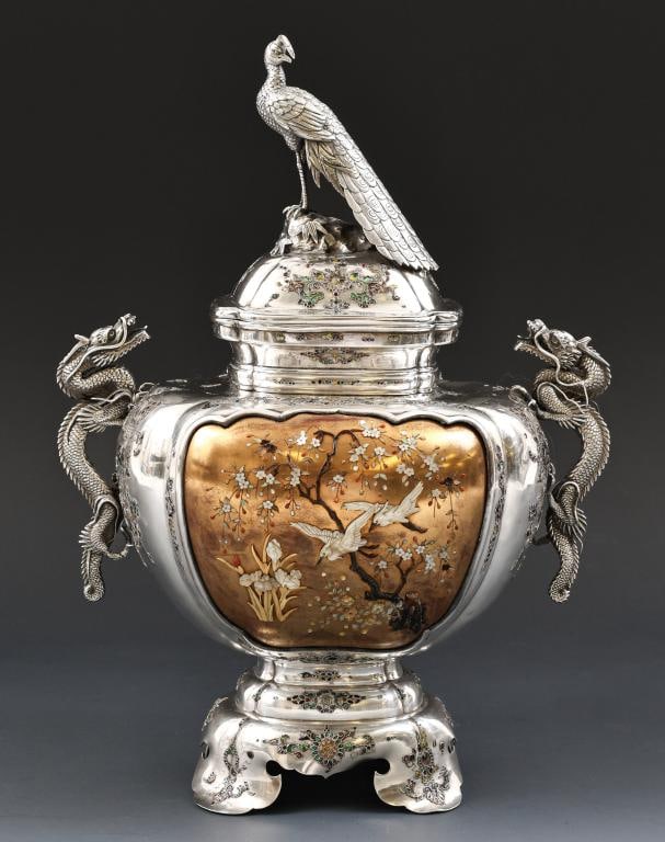 Yoshihide Japanese Silver Shibayama Koro: Meiji era silver koro urn of lobed bulbous form with two inset gold fundame panels decorated with inlaid mother of pearl and other natural materials, forming egrets flying among cherry blossoms in one