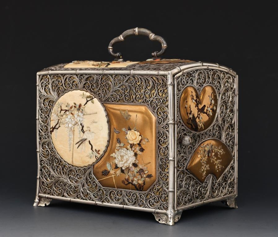 Japanese Silver Shibayama Kodansu Cabinet: Meiji era kodansu incense cabinet, with a silver faux bamboo frame and handle and scrolling silver filigree over gold fundame lacquer, holding inset panels of gold fundame lacquer and other natural ma