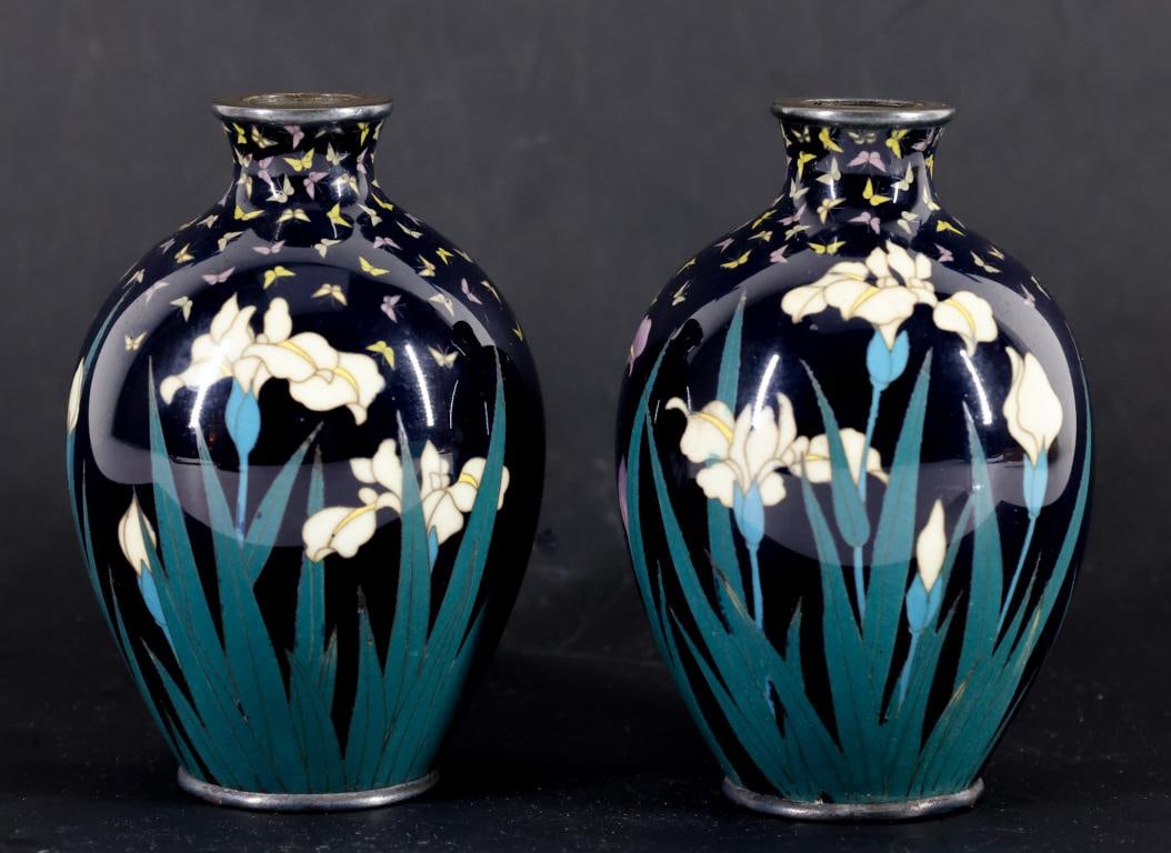 Japanese Cloisonne Vases: Meiji - Taisho era pair of silver wire cloisonne miniature vases with silver plated mounts, decorated with irises and butterflies on a black ground. Unmarked. 3.25"h x 2"w