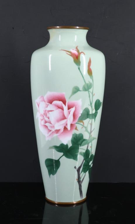 Kumeno Teitaro Japanese Wireless Cloisonne Vase: Meiji - Taisho era musen shippo / wireless cloisonne vase decorated with roses on a seafoam green ground. Marked to the foot for Kumeno Teitaro (1865 - 1939). There is evidence of a touch-up to the ri