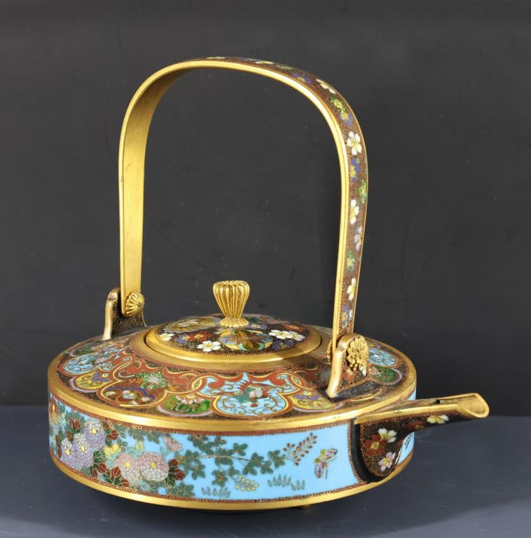 Japanese Goldstone Cloisonne Sake Pot: Meiji - Taisho era silver wire cloisonne vase with gilding, the sides decorated with chrysanthemums and butterflies on a turquoise ground, the top and spout decorated with floral motifs and goldstone 