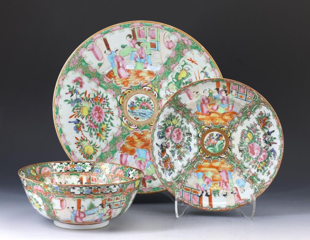 Chinese Rose Medallion Porcelain Dishes: Qing era export porcelain, decorated with figures in court scenes, birds, butterflies, flowers, and fruit, including a chop plate, a serving bowl, and a soup bowl. The bowls both show some roughness/c