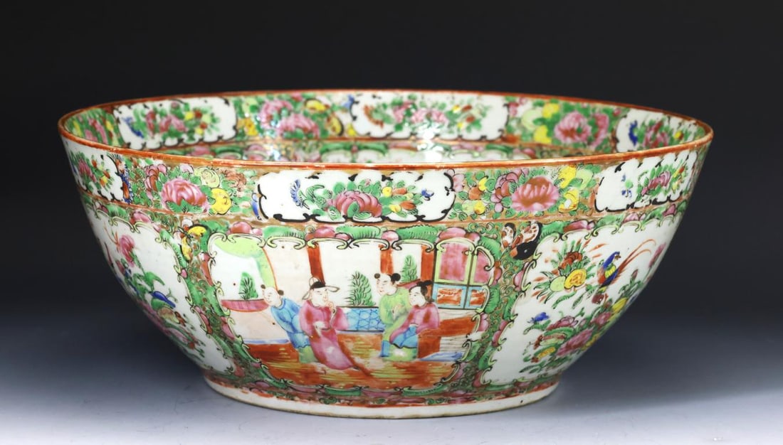 Chinese Rose Medallion Porcelain Punch Bowl: Qing era export porcelain bowl, decorated with figures in court scenes, birds, butterflies, flowers, and fruit. Some areas of glaze loss. 6"h x 14.5"w
