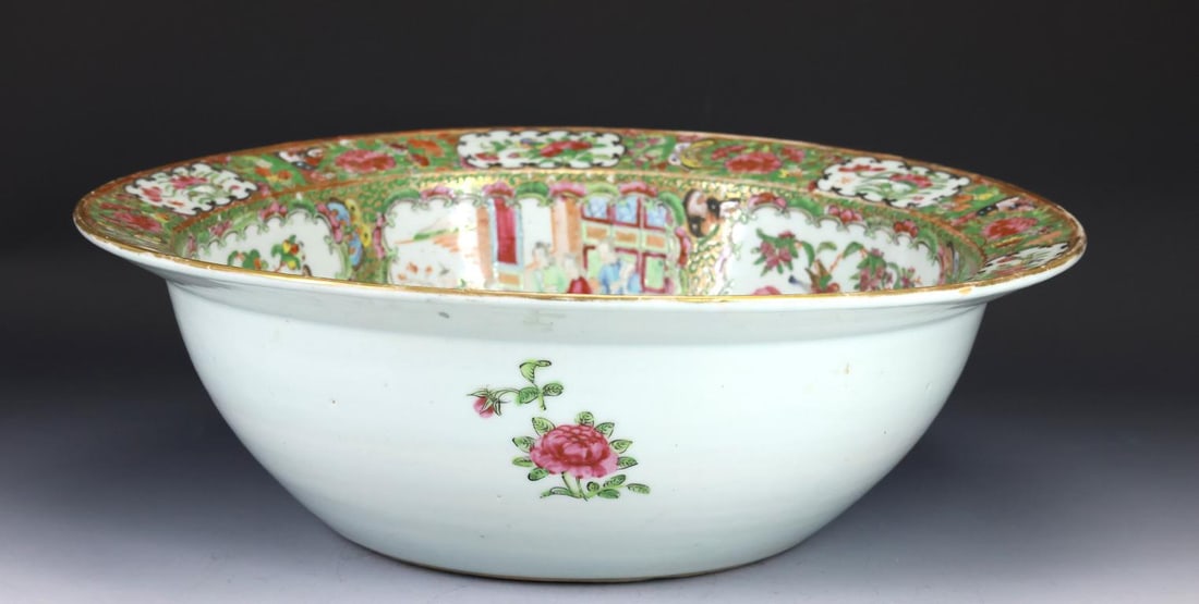 Chinese Famille Rose Porcelain Bowl: Qing era export porcelain, decorated with figures in court scenes, birds, butterflies, flowers, and fruit, and featuring a wide rim. Some areas of glaze loss. 5.25"h x 16"w
