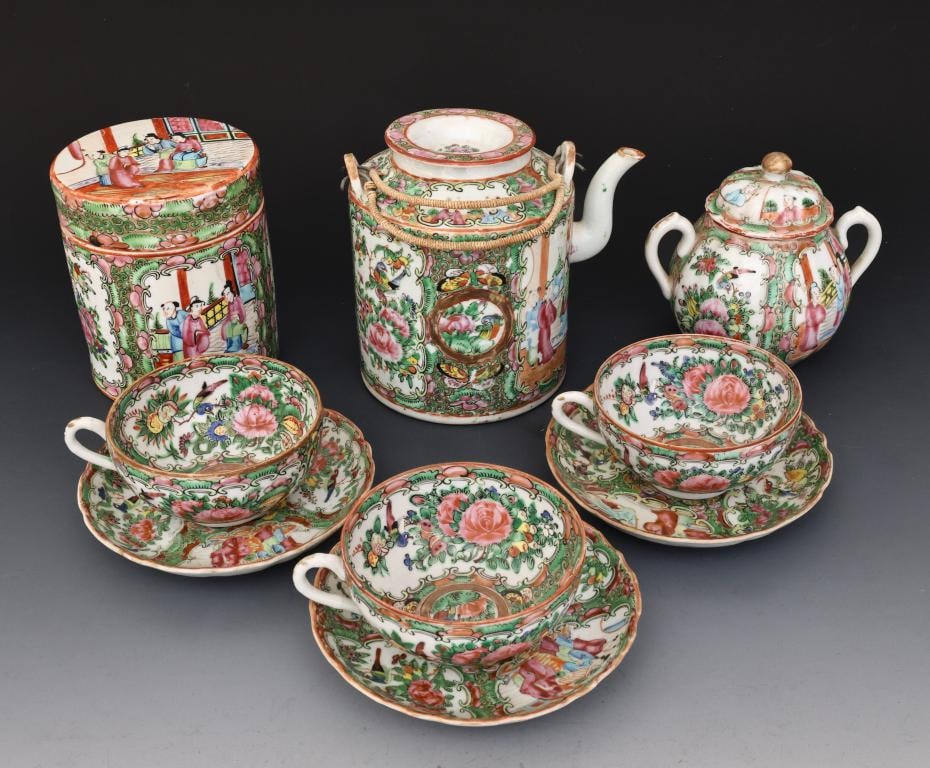 Chinese Rose Medallion Porcelain Tea Wares: Qing era export porcelain, decorated with figures in court scenes, birds, butterflies, flowers, and fruit, including a teapot 5.75"h x 6"w, a covered sugar bowl 4.75"h x 5"w, a tea caddy 5"h x 4"w, te