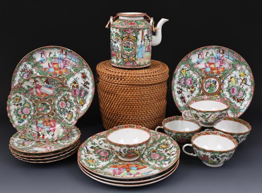 Chinese Rose Medallion Porcelain Tea Wares: Qing era export porcelain pieces, decorated with figures in court scenes, birds, butterflies, flowers, and fruit, including a teapot 5.25"h x 5.75"w, with a fitted basket 6.75"h x 7.25"w, plates 8.5"w
