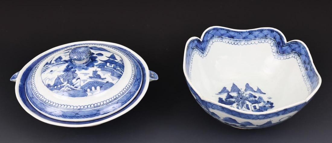 Chinese Canton Porcelain Serving Dishes: Qing era blue and white export porcelain pieces, decorated with buildings, boats, a bridge, and mountain scenery with rain and cloud borders, including a covered food warmer with mushroom finial, 5"h 