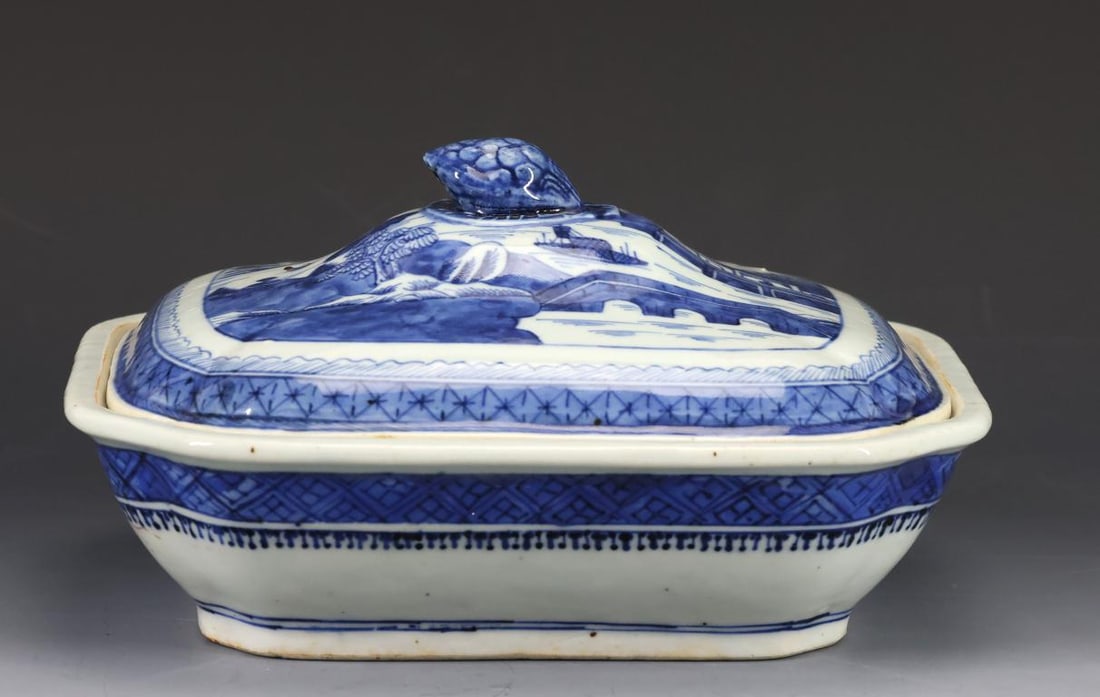 Chinese Canton Mixed Pattern Porcelain Covered Dish: Qing era blue and white export porcelain covered square serving dish with indented corners, featuring mixed patterns, the Canton motif cover decorated with buildings, boats, a bridge, and mountain sce