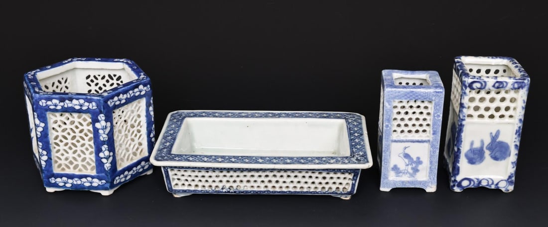 Chinese and Japanese Blue and White Reticulated Porcelain: Chinese Qing era porcelain scholars items with reticulated sides, including a hexagonal cricket cage with prunus decoration, 3.5"h x 4.25"w, a small rectangular planter with trellis and fish roe borde