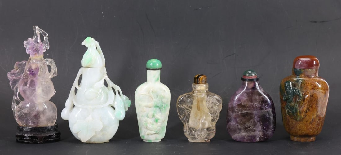 Chinese Snuff Bottles: Qing era snuff bottles, including an amethyst gourd form example (previously glued to stand), a green-white nephrite gourd form example, a green-white jade example with low relief chilong dragon carvi