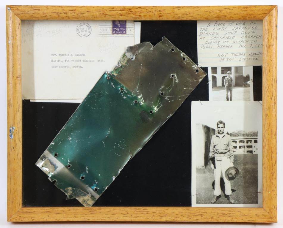 Aluminum Fragment Of Japanese Aircraft Shot Down At Pearl Harbor, December 7, 1941: Frame containing items belonging to Sergeant Thomas Banjock Sr., a soldier in the 25th Infantry Division that was stationed at Schofield Barracks, in Hawaii during the Japanese attack on Pearl Harbor 