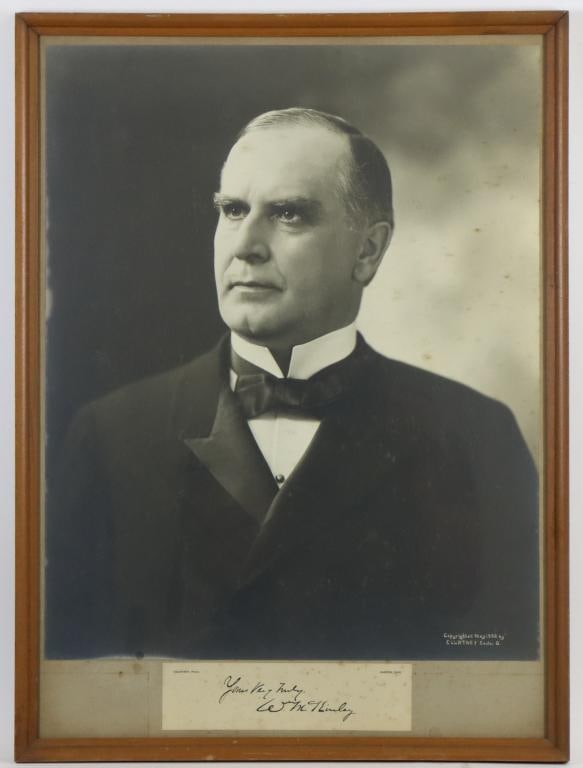 Large-Format Photograph of President William McKinley: Framed photograph by Courtney of Canton, Ohio of bust view of President William McKinley. Photograph measures 21.24" x 17" mounted on board measuring 24.5" x 18" (sight) and is housed in frame measuri