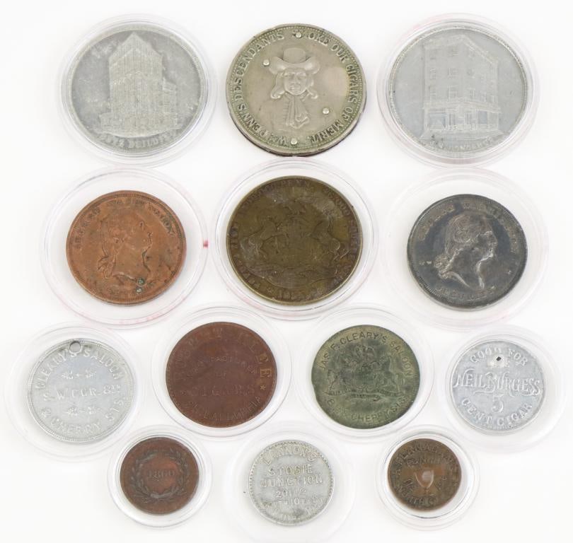 Late 19th Century/Early 20th Century Philadelphia Trade Tokens: Collection of 12 Philadelphia trade tokens and cigar knife including; 1.) Cleary’s Saloon, 8th & Cherry Sts. Token presents Pennsylvania seal on reverse is brass and measures 28mm. 2.) Perpetual