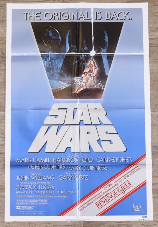 Star Wars Poster: Star Wars re-release 1982 one sheet movie poster promoting the upcoming release of “The Revenge of the Jedi”, R820106 print run, folded. 41”h x 27”w. Artwork by Tom Jung.