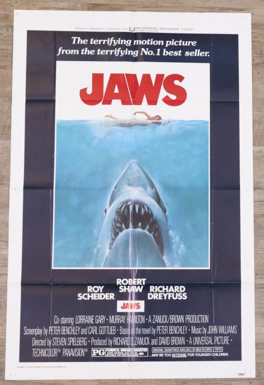 Jaws Poster: Jaws 1975 original one sheet movie poster, folded with pin holes in corners. 41”h x 27”w. Artwork by Roger Kastel.