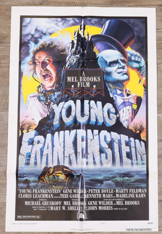 Young Frankenstein Poster: Young Frankenstein original 1974 one sheet movie poster, style B, folded with small tears in crease corners and pin holes in corners. 41”h x 27”w. Artwork by John Alvin.